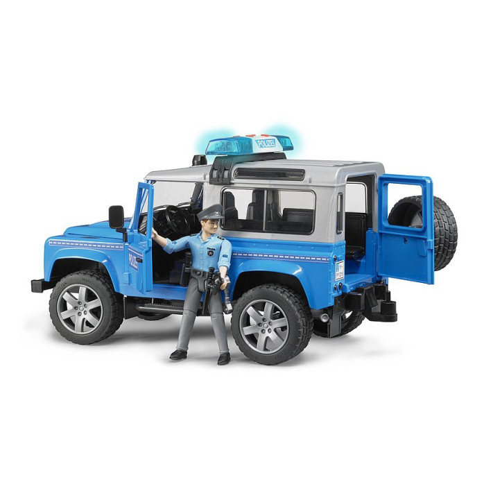 Policajné vozidlo Land Rover Defender Station Wagon so svetelným a zvukovým modulom a s figúrkou policajta 1:16 02597